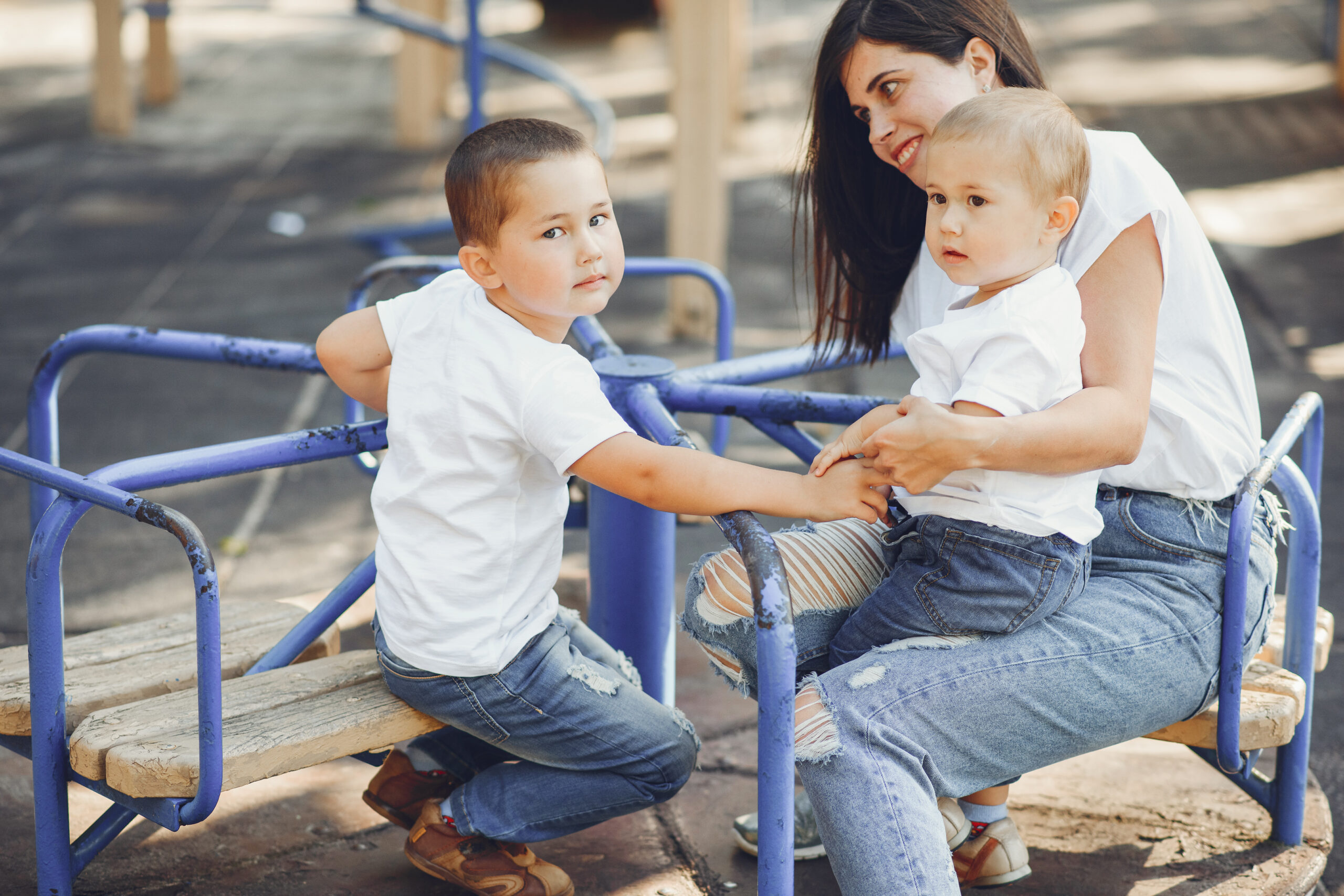 mother with little child on a playground